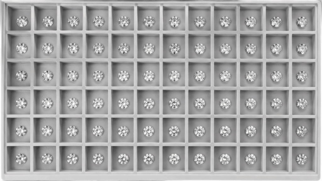 A sorting tray of uniform diamonds representing the consistency advantage of wholesale lab created diamonds