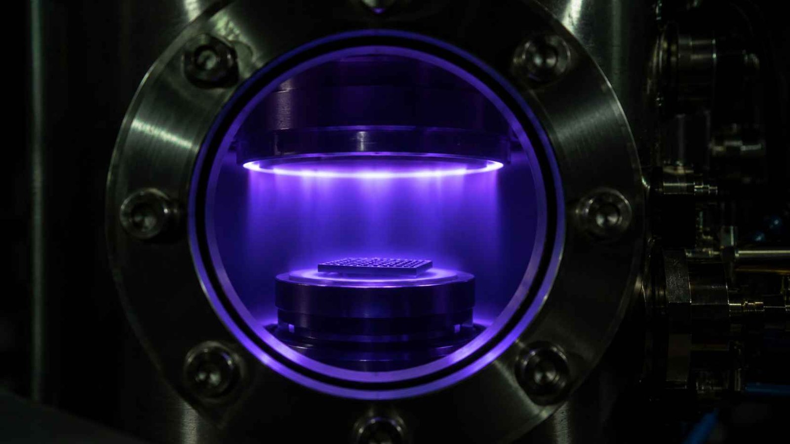 CVD reactor chamber showing microwave plasma during engineered diamond growth