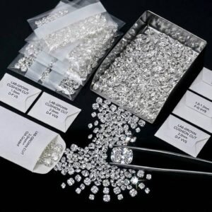 VVS clarity D to F color lab grown cushion cut diamond lots in labeled sorted packaging.